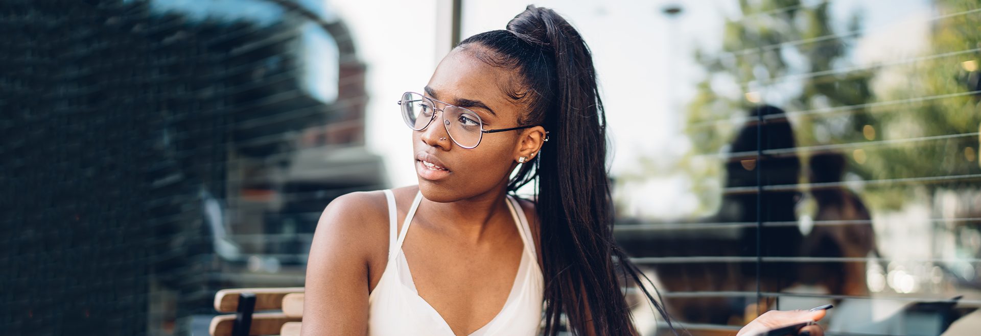 young confident african american woman looking to her right